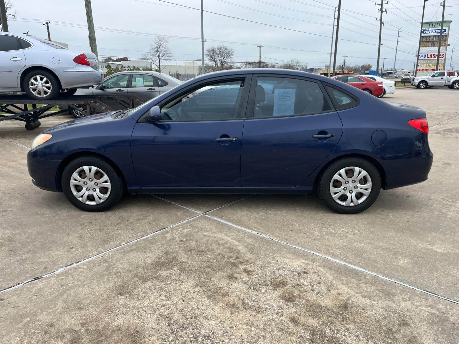 2010 blue Hyundai Elantra GLS (KMHDU4ADXAU) with an 2.0L L4 DOHC 16V engine, Automatic transmission, located at 14700 Tomball Parkway 249, Houston, TX, 77086, (281) 444-2200, 29.928619, -95.504074 - Photo #3